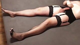 Long legs crossdresser in fishnet stockings lingerie