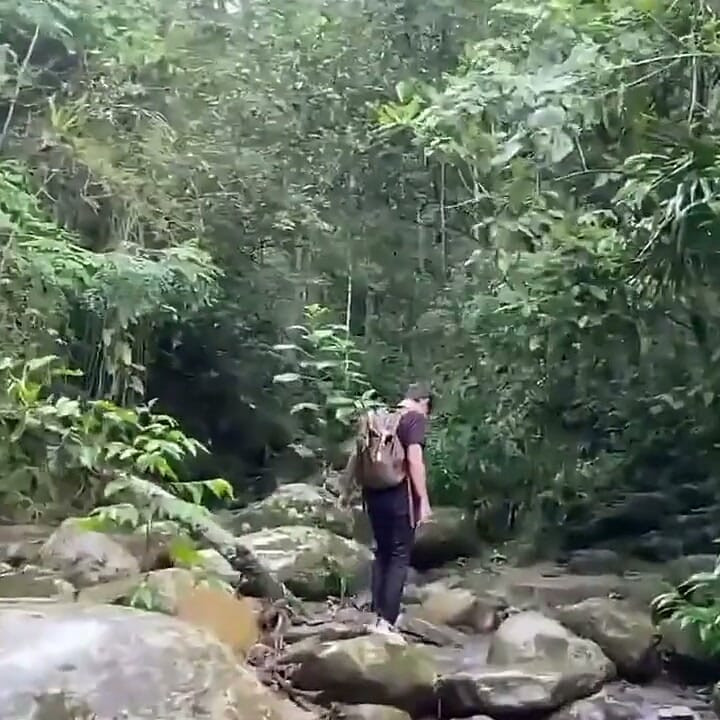 Latino masturbates in a waterfall and fills with milk