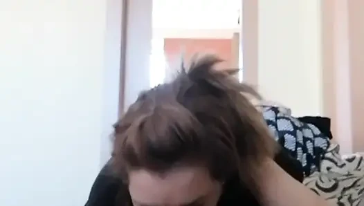 While he watches TV, I give him a blowjob