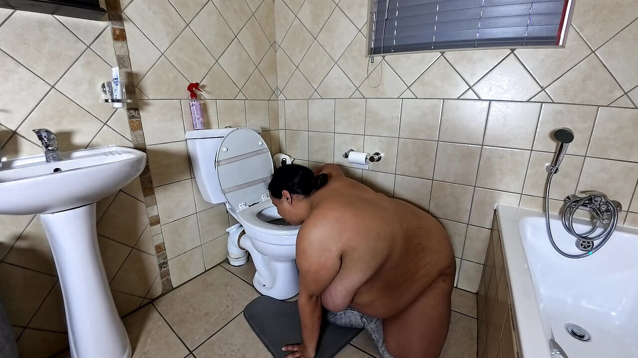 Playing with my fat pussy while licking the toilet