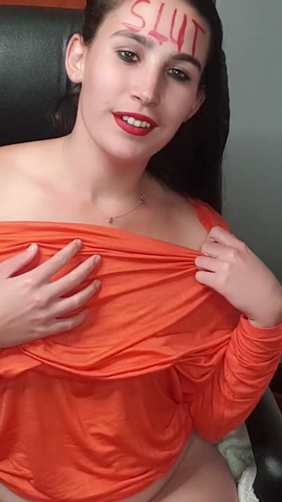 Slut talking dirty to her cock viewers while stripping and rubbing her pussy | Clip 1