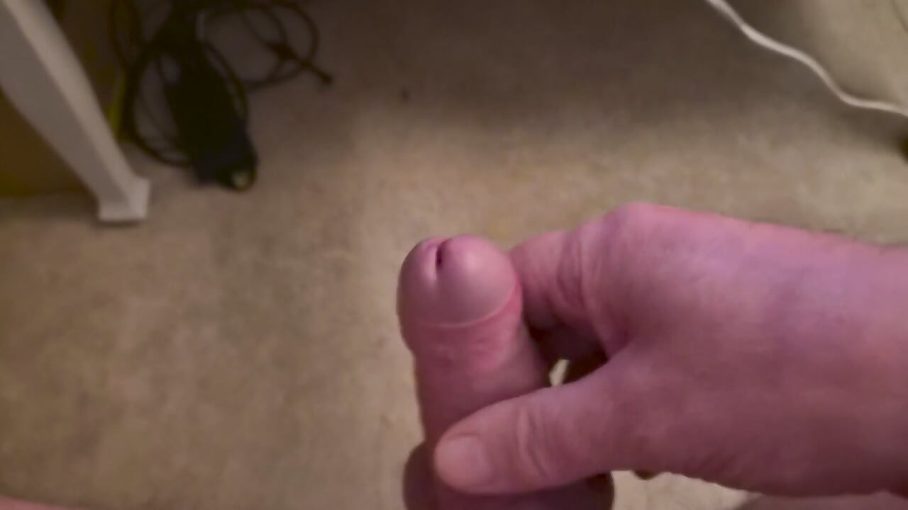 My Friend Sits in a Chair and Jerks off His Cock While Watching Video