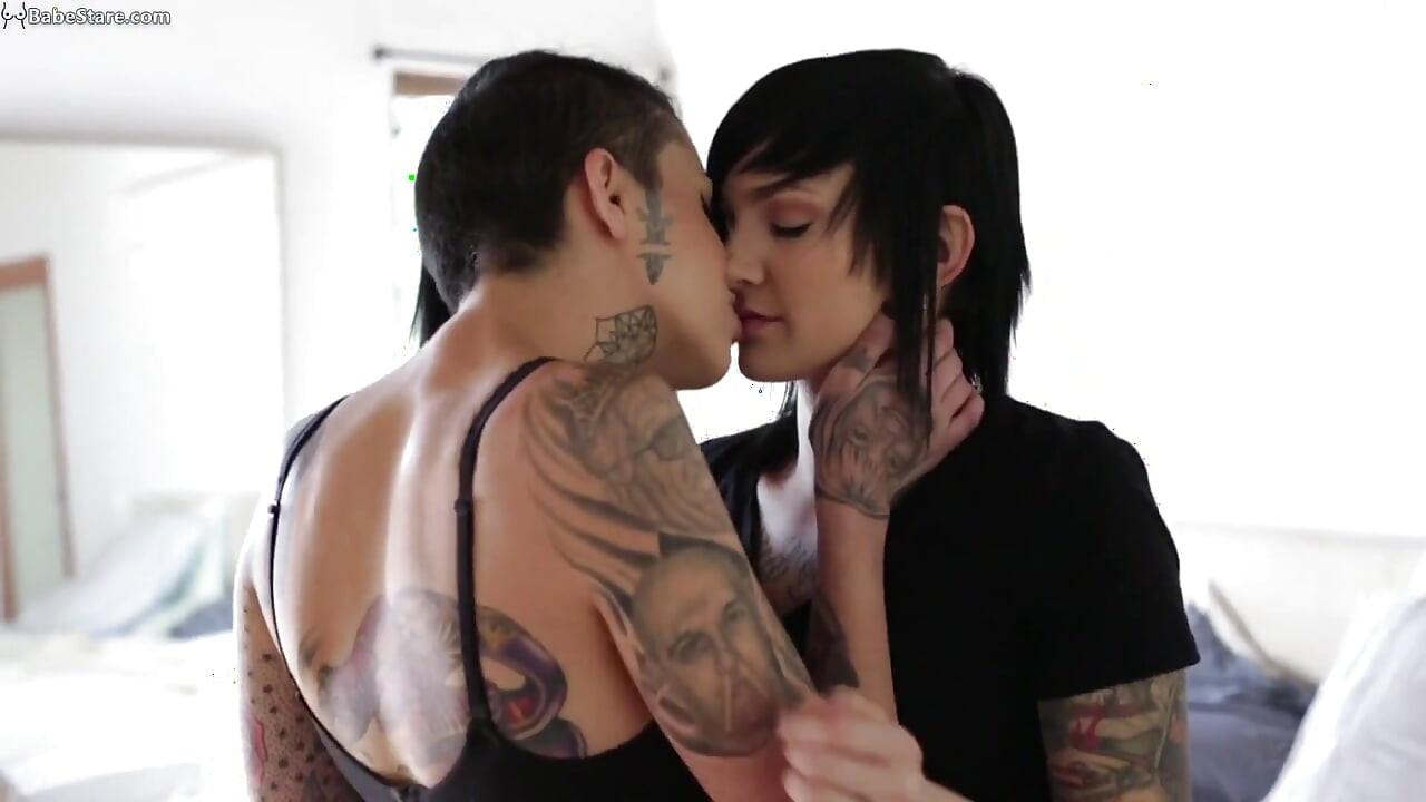 Two horny lesbians fuck each other's shaved pussies