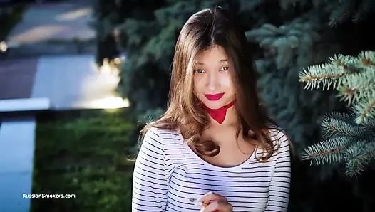 Sultry Russian Girl Smoking Cigarette by Waves