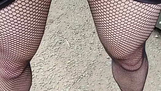 Squirt through fishnets in public. Walk and wank outdoors.