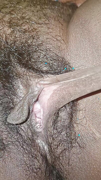 The village woman is showing her large pussy