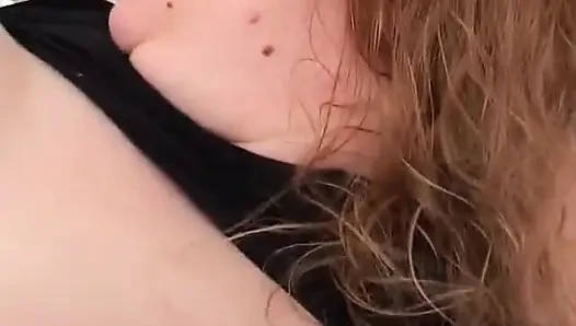 Amateur fat woman plays in her bed with some dildos