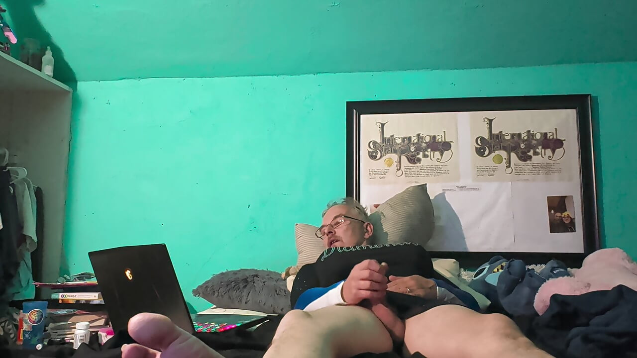 Masturbating in wife's cheerleading uniform.