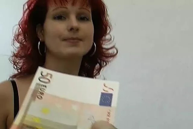 Beautiful German redhead playing with her favorite sex toy