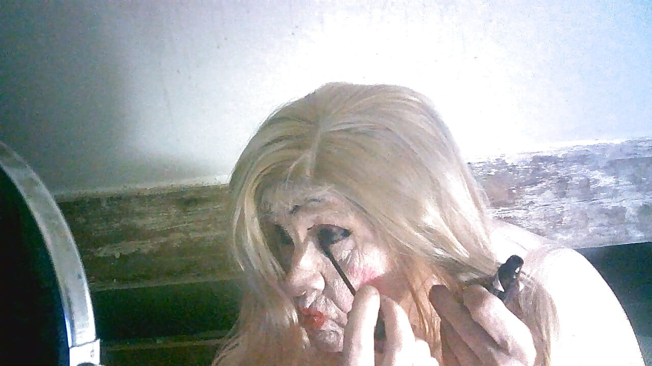 Ugly old sissy spunk bucket slag Sarah tries to make herself attractive to men by applying makeup to her ugly slag face