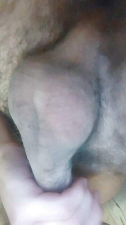 The chastity belt boy jerks off his dick and cums.