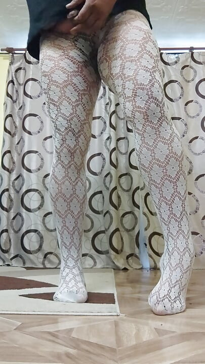 Masturbating in sexy white pantyhose on sexy legs