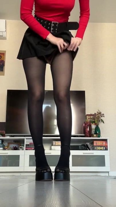 Emotional moment from "Pretty Student Try-On Heels in Short Skirt & Stockings"