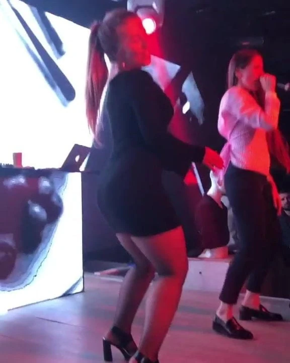 RUSSIAN GIRL IN CLUB SHOWING OFF BODY TEASING WHITE BOYS!