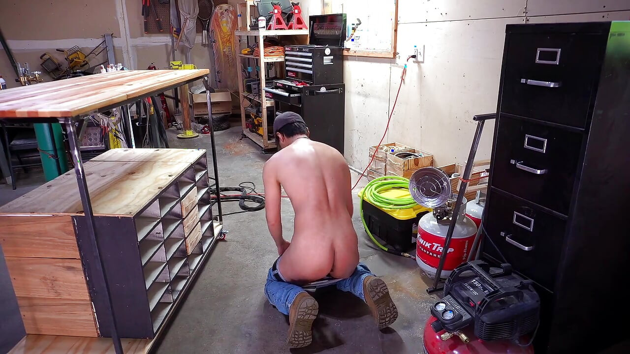 Ass stuffed handy man uses his welder to make a work bench