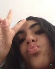 Sexy girl sticking out tongue