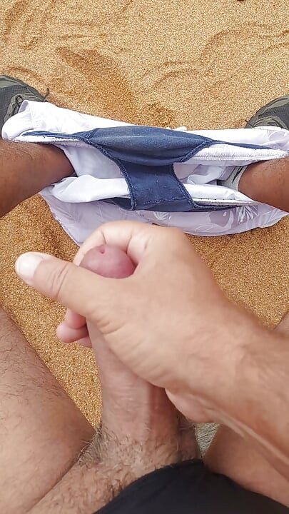 Ladysilva masturbating his cock on a deserted beach until he cums hot