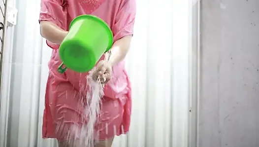 VOYEUR OF A PLUMP INDIAN WIFE IN A TRANSPARENT SATIN DRESS