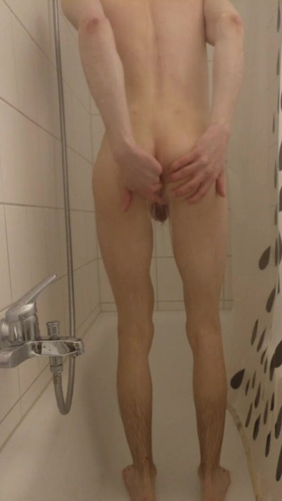 Twink boy fingering himself in shower
