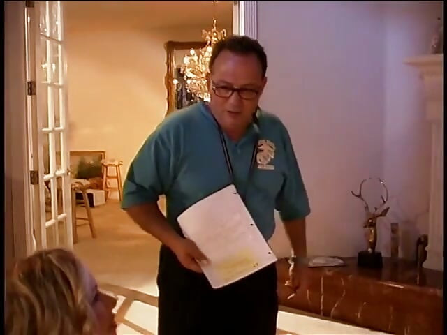Behind the scenes footage of a camera crew filming a porn movie