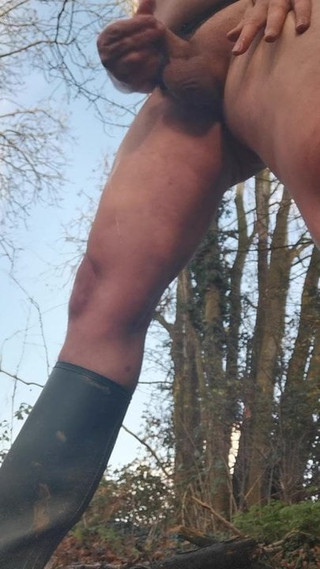 Wanking outside in panties and wellies...