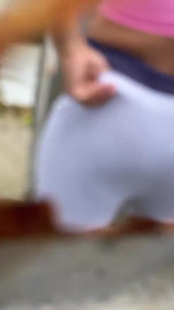 Key moment from "Camera records WOMAN in beach dressing room without realizing it (LATINA RECORDED BY PERVERT)"