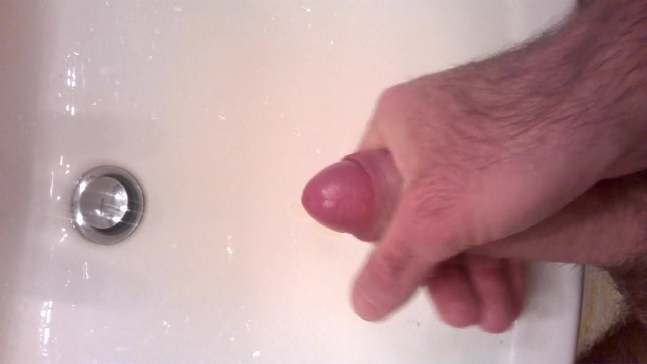 Masturbating