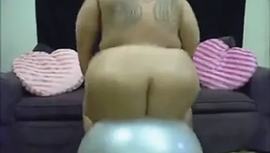 Emo BBW Barbi Doll is bouncing on a yoga ball