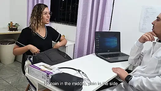 Medical examination of the patient's abdomen in the doctor's office.