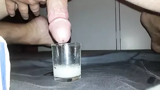 Cumming in small glass