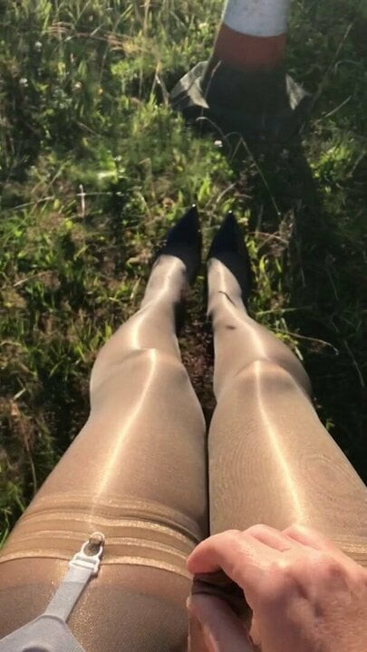 Crossdressing outdoors in shiny nylon & layered pantyhose