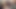 セクシーな美女の手が彼の体と小さなペニスを探っている