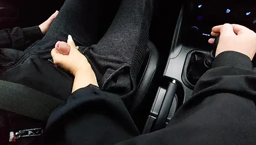 Amateur MILF gives a handjob to a taxi driver and teases him in the car, in public