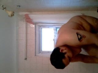OUR  MAN  TAKING   A SHOWER