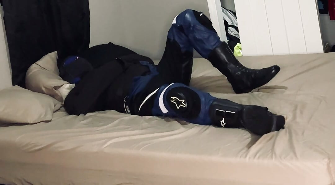 Biker in A Straitjacket and Tied