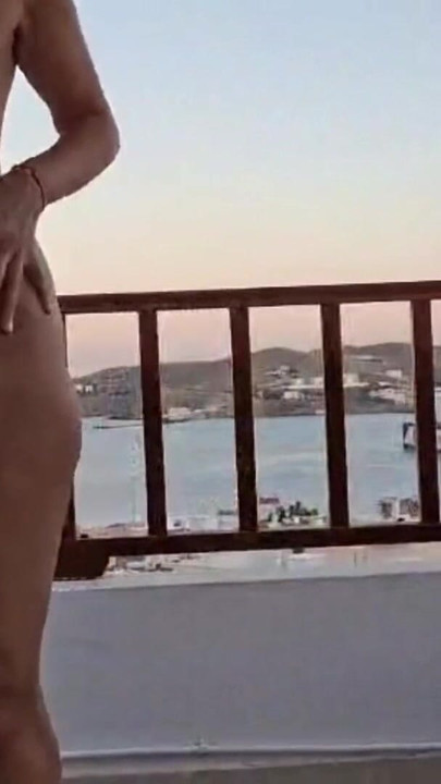Naked sexy milf on rooftop terrace in Greece | Clip 2