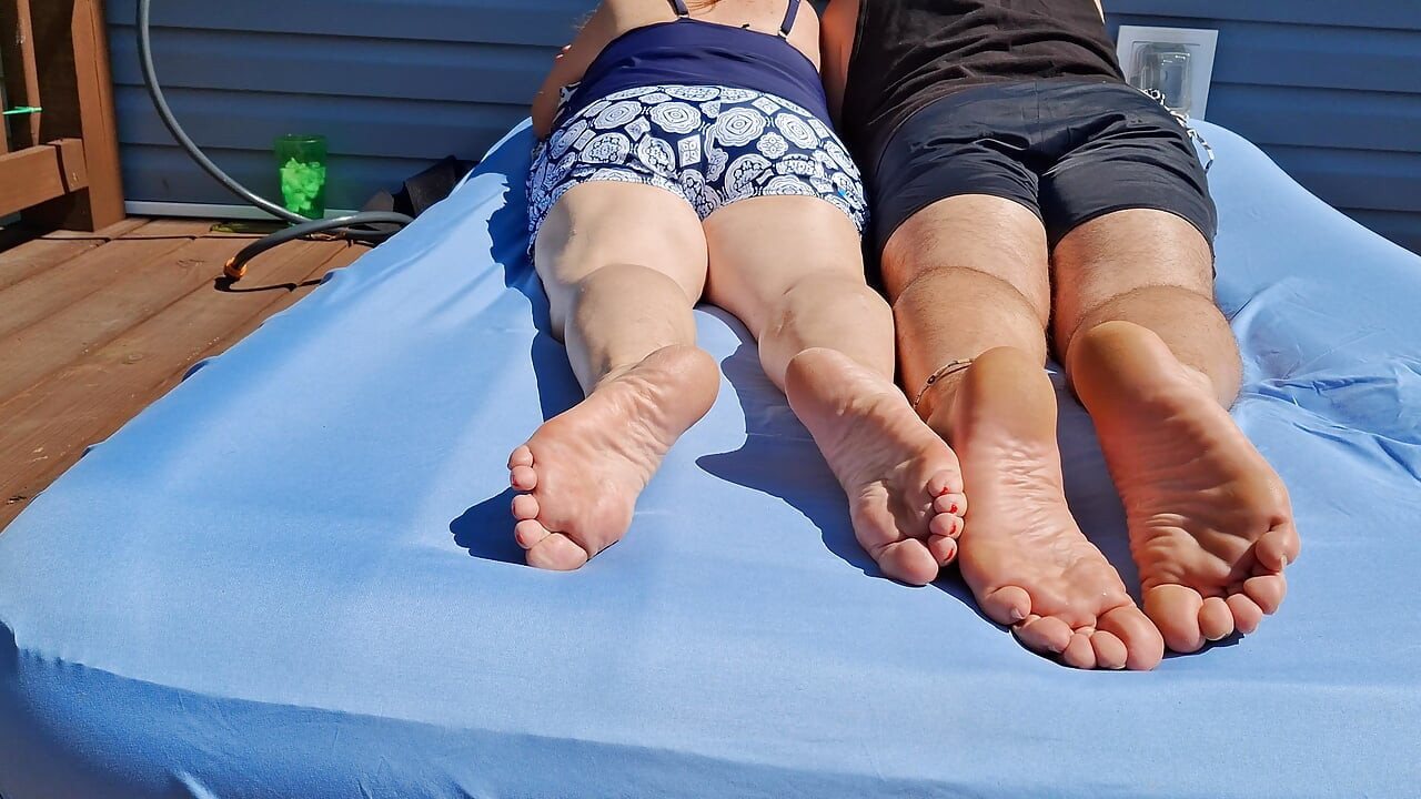 Relaxing and showing our legs and soles outside
