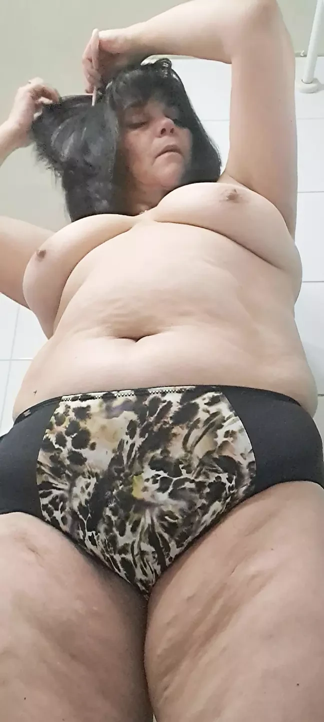 Milf pulling down her panties showing her hairy pussy and ends up brushing her teeth, part 2