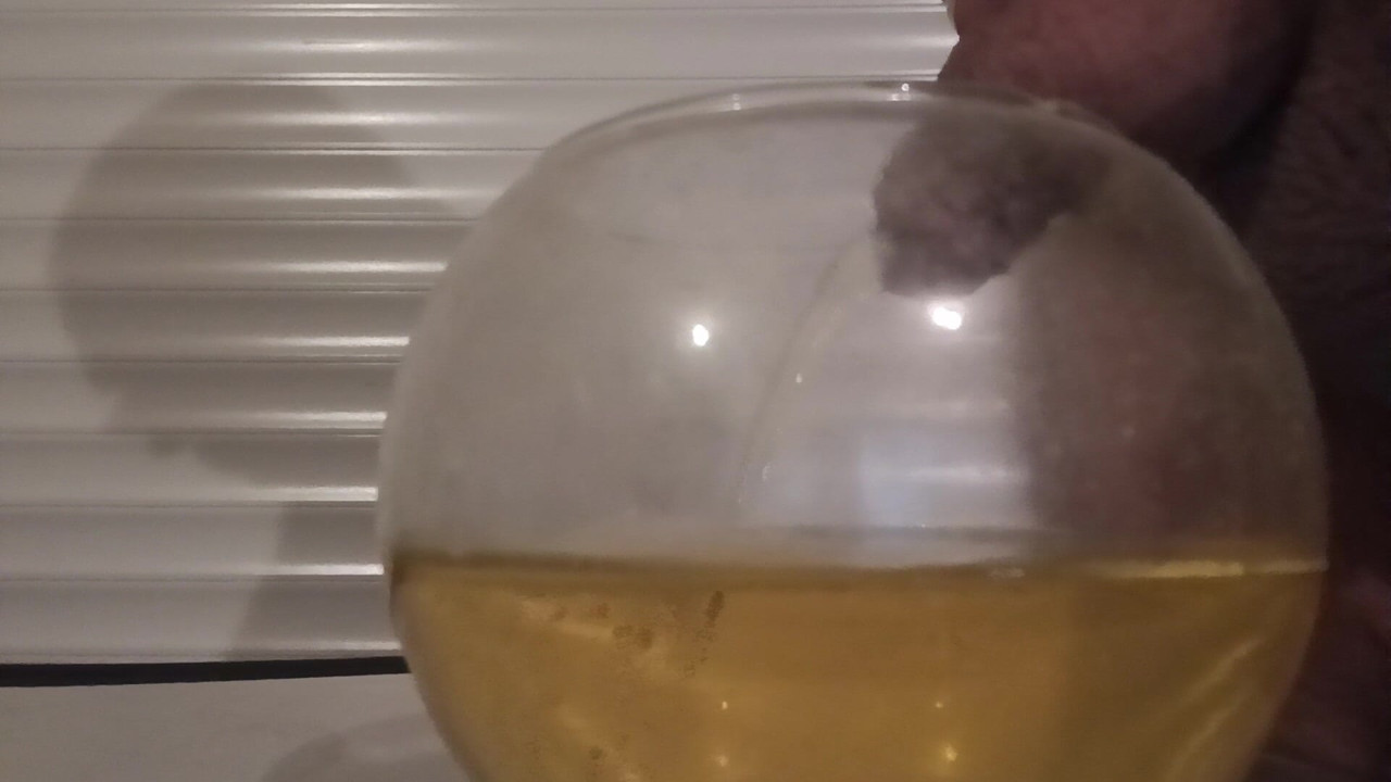 Pissing in a glass bowl.