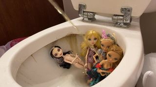 Pissing on four dolls