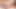 Busty brunette ladyboy in black dress jerks off solo in bed