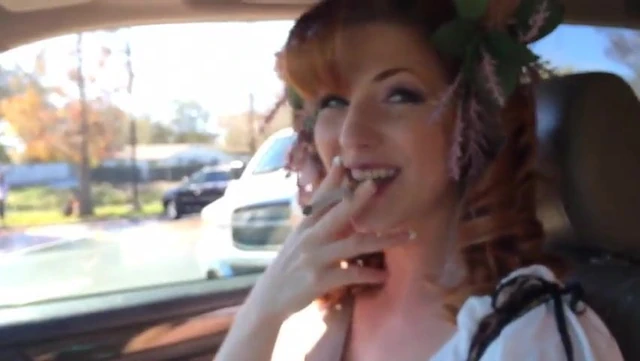 redhead smoking in car
