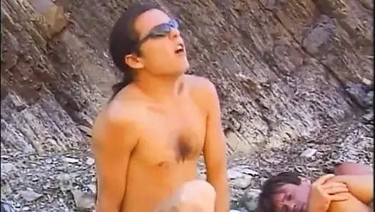 Threesome fucking on the beach