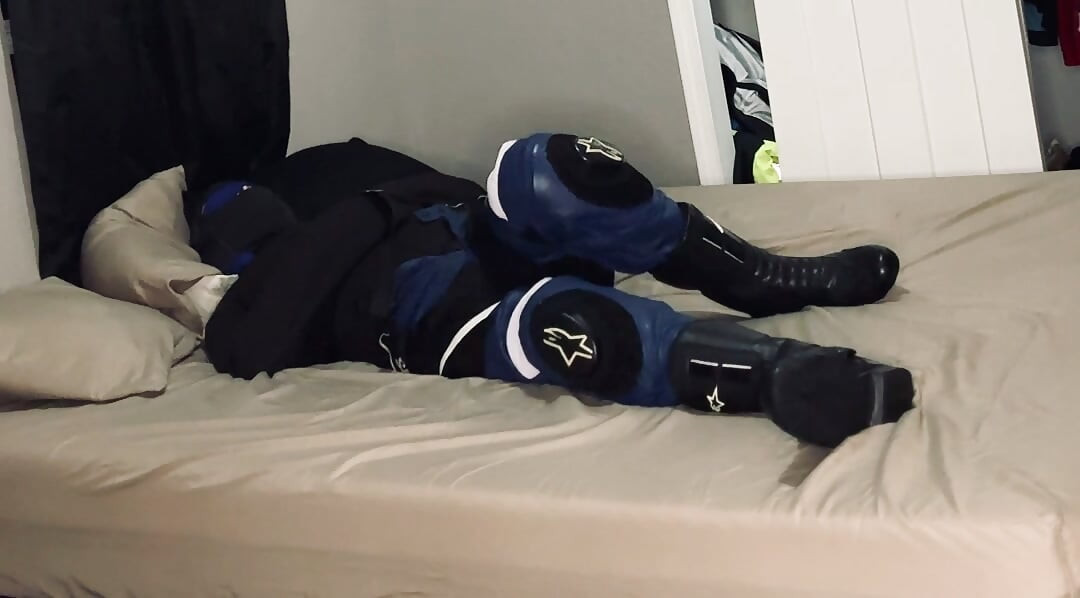 Biker in A Straitjacket and Tied