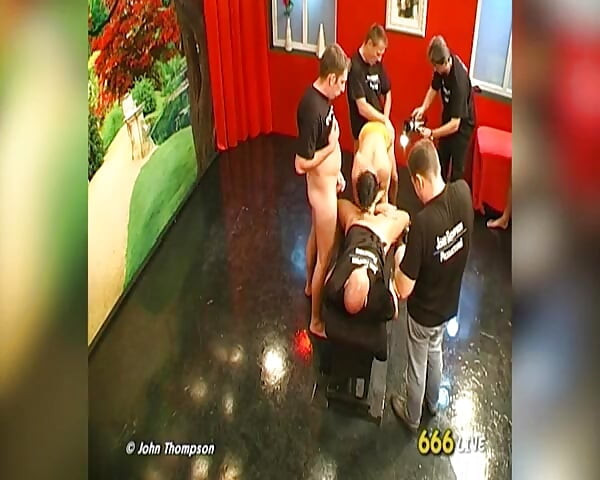 Brunette Slut Drenched in Piss by Multiple Men