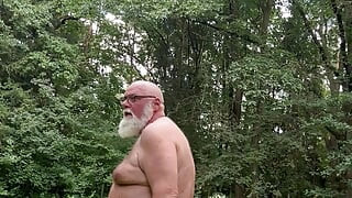 Ralf, the fat, deviant perverted gay bastard, jerks off naked in public in a cemetery and squirts.