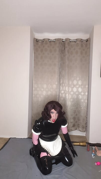 Latex Catsuit and Maid Dress Sissy Tries to Fuck Both of Her Holes with Dildos