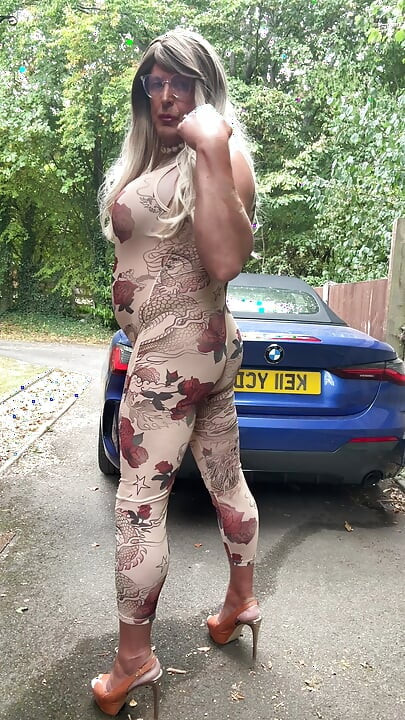 Sexy Crossdresser kellycd2022 in sexy floral see thru catsuit and heels