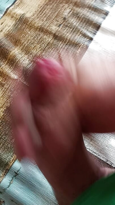 Jerking off my big fat cock until I cum a lot in the foreground