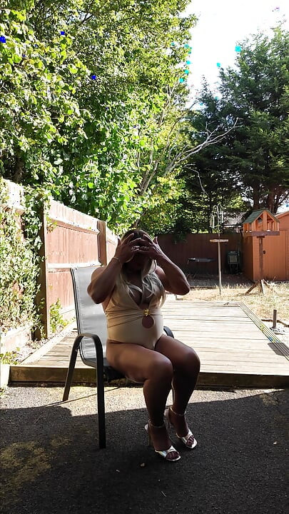 Sexy Crossdresser kellycd2022 in gold coloured swimsuit and heels